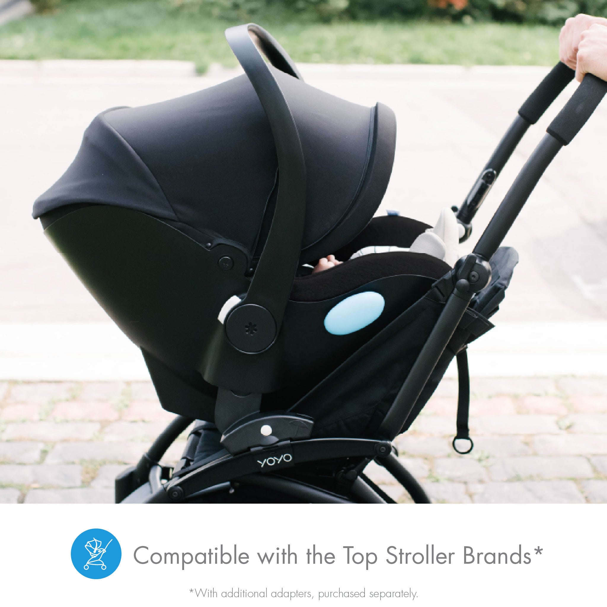 Clek Liing on a baby stroller with canopy on a blurred outdoor background all-groups