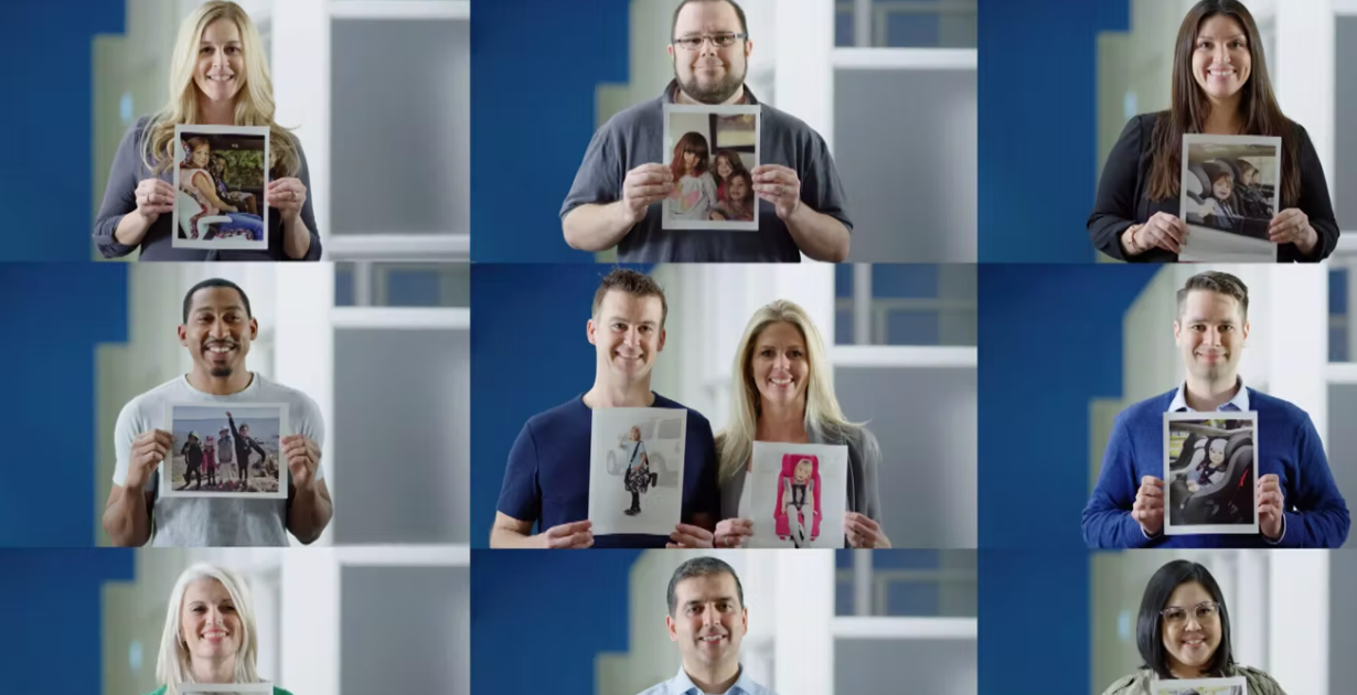 Clek team members holding images of their kids in Clek car seats