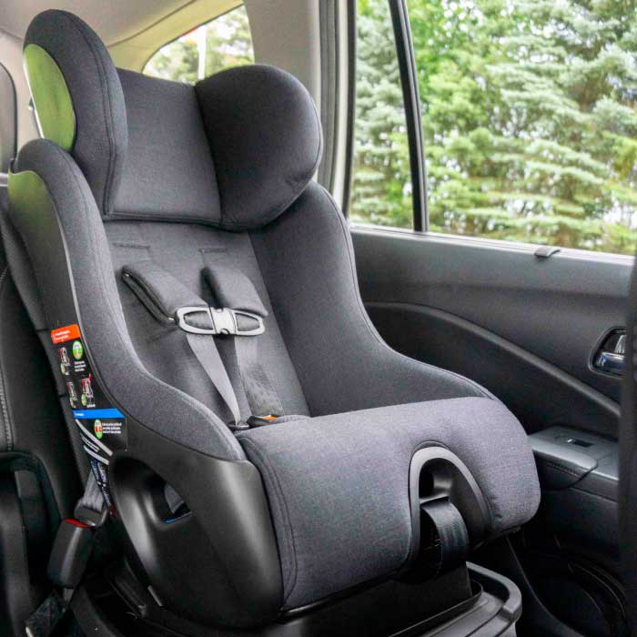Clek Fllo convertible car seat in mammoth fabric installed forward-facing.